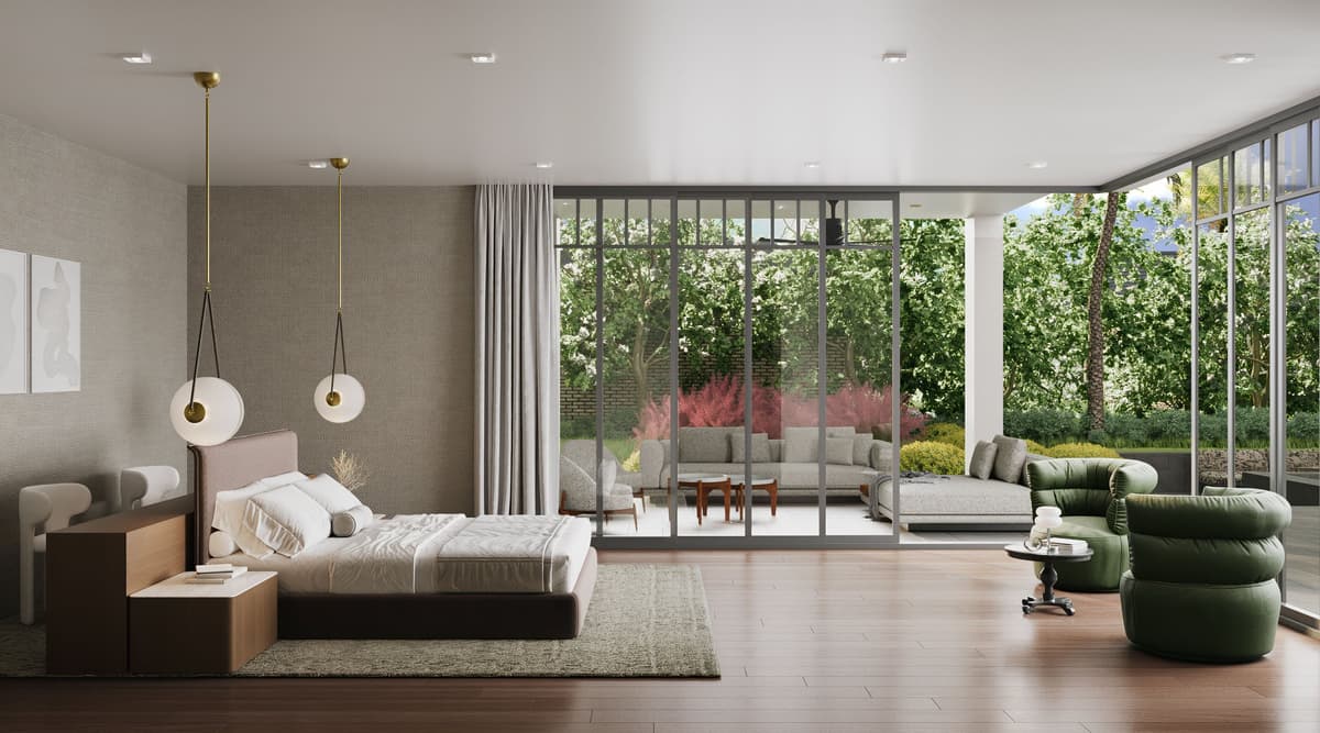 Primary suite opening through glass walls to a garden sitting area