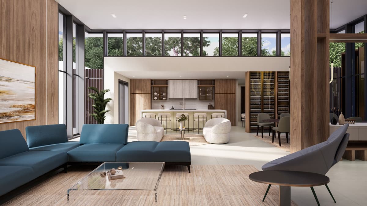 Living room under clerestory windows, with a blue sectional and a wine wall